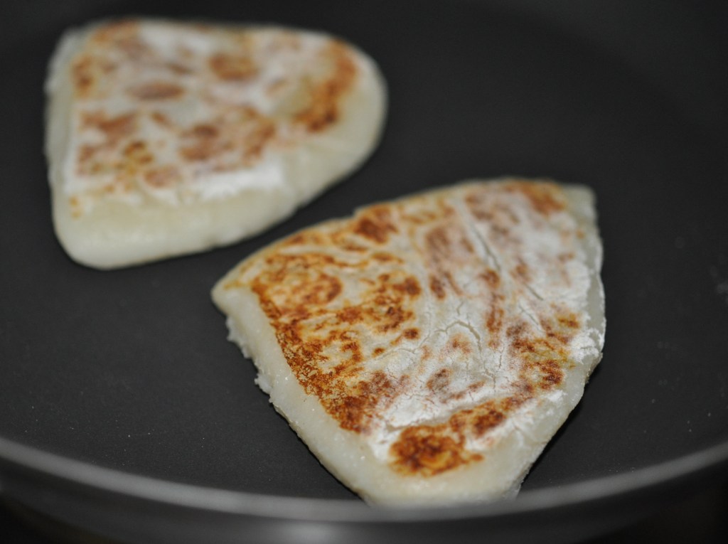 potato bread cooking on a un-greased pan