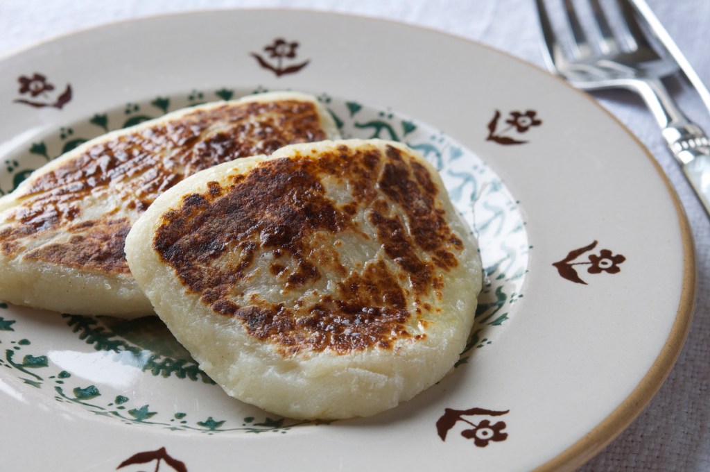 cooked potato bread served on an irish pottery plate